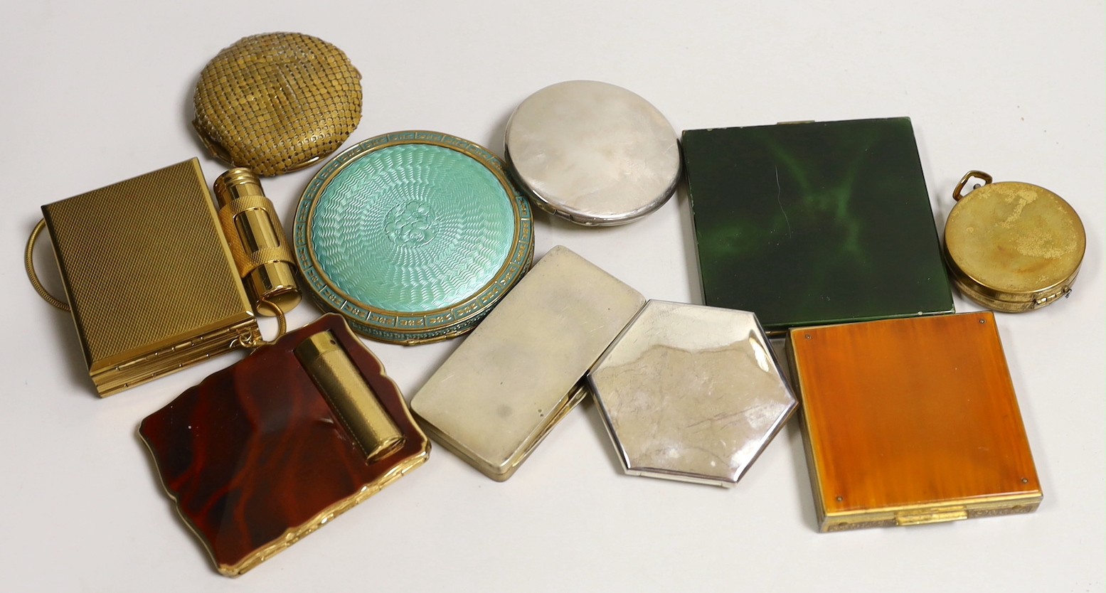 A collection of mostly enamel ladies compacts, two compacts including lipstick, (10).